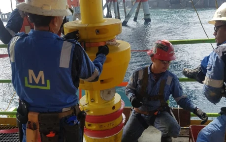Men with a large pipe but its vertical this time